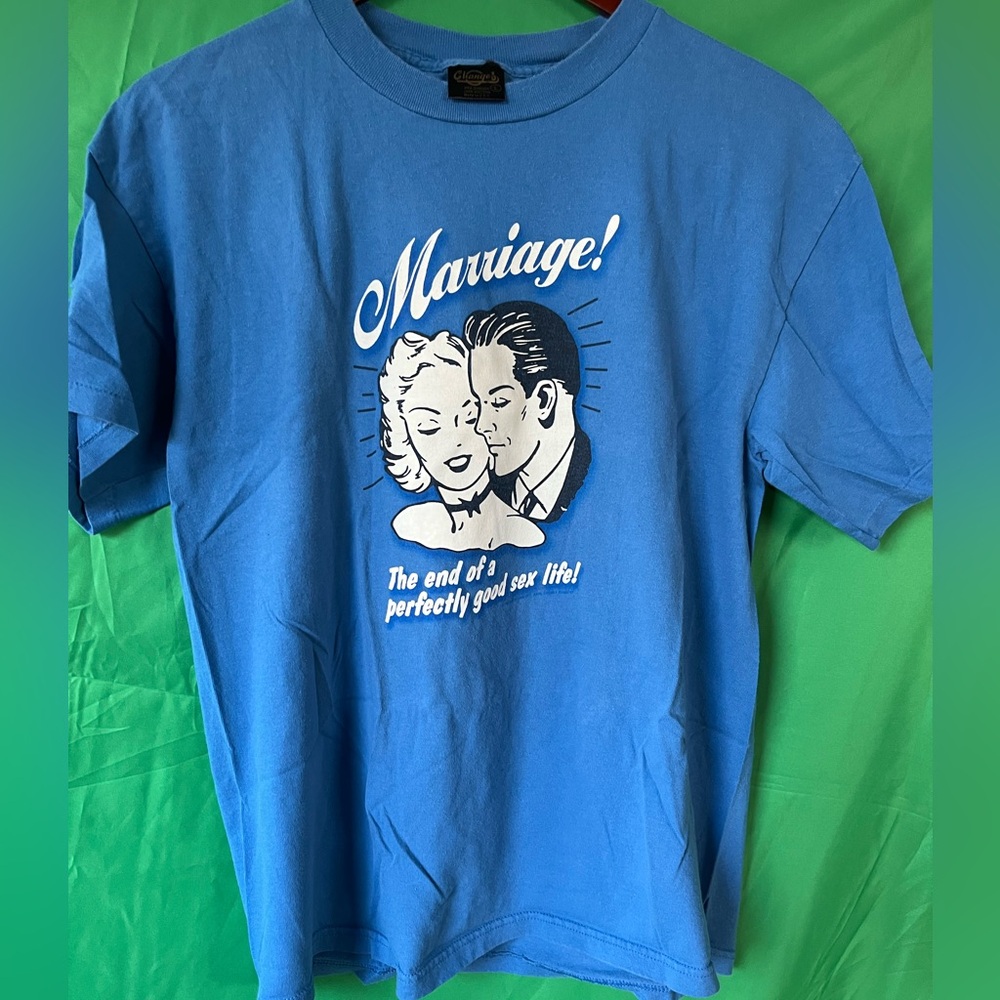 Satirical short sleeve t-shirt, adult size large, blue. Great used condition!